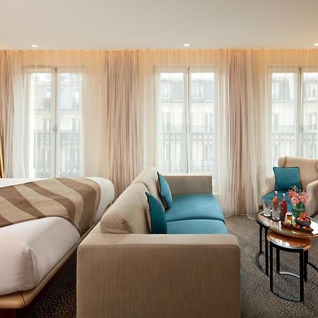 Maison Albar Hotels Le Pont-Neuf Paris Extérieur photo A suite at the hotel