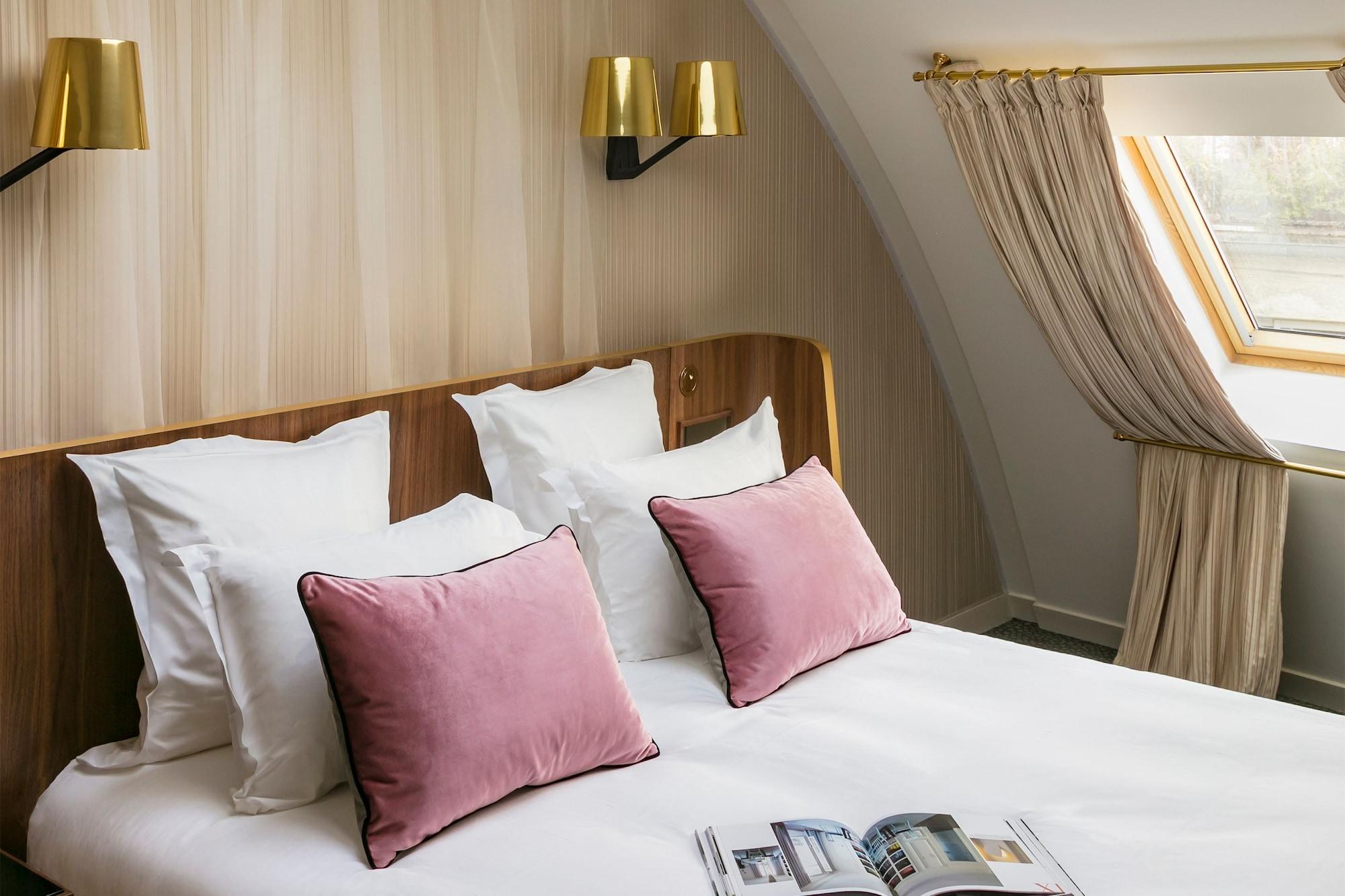 Maison Albar Hotels Le Pont-Neuf Paris Extérieur photo A room at the hotel