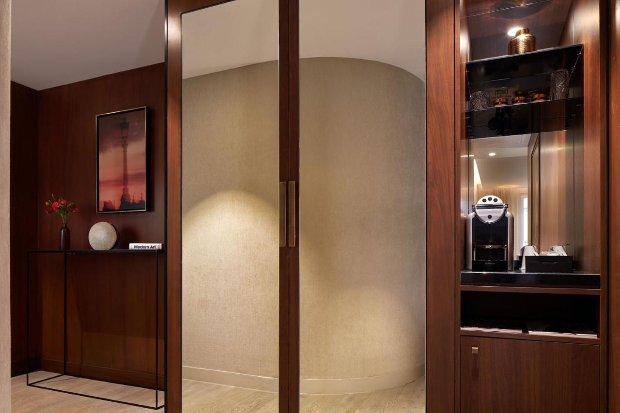 Maison Albar Hotels Le Pont-Neuf Paris Extérieur photo A sliding door