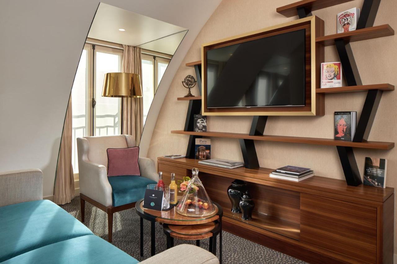 Maison Albar Hotels Le Pont-Neuf Paris Extérieur photo A suite at the hotel