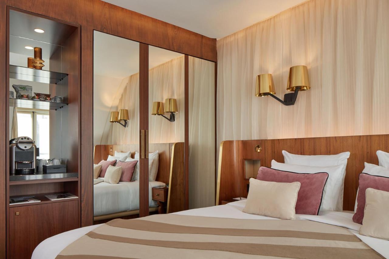Maison Albar Hotels Le Pont-Neuf Paris Extérieur photo A room at the hotel