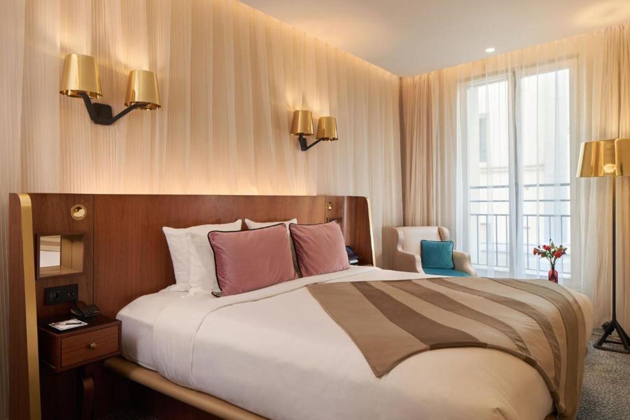Maison Albar Hotels Le Pont-Neuf Paris Extérieur photo A bedroom at the hotel